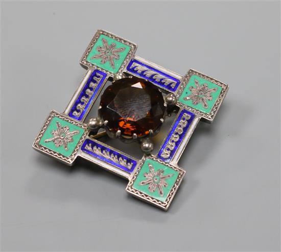 An early 20th century white metal citrine and two colour enamel diamond shaped brooch, 51mm.